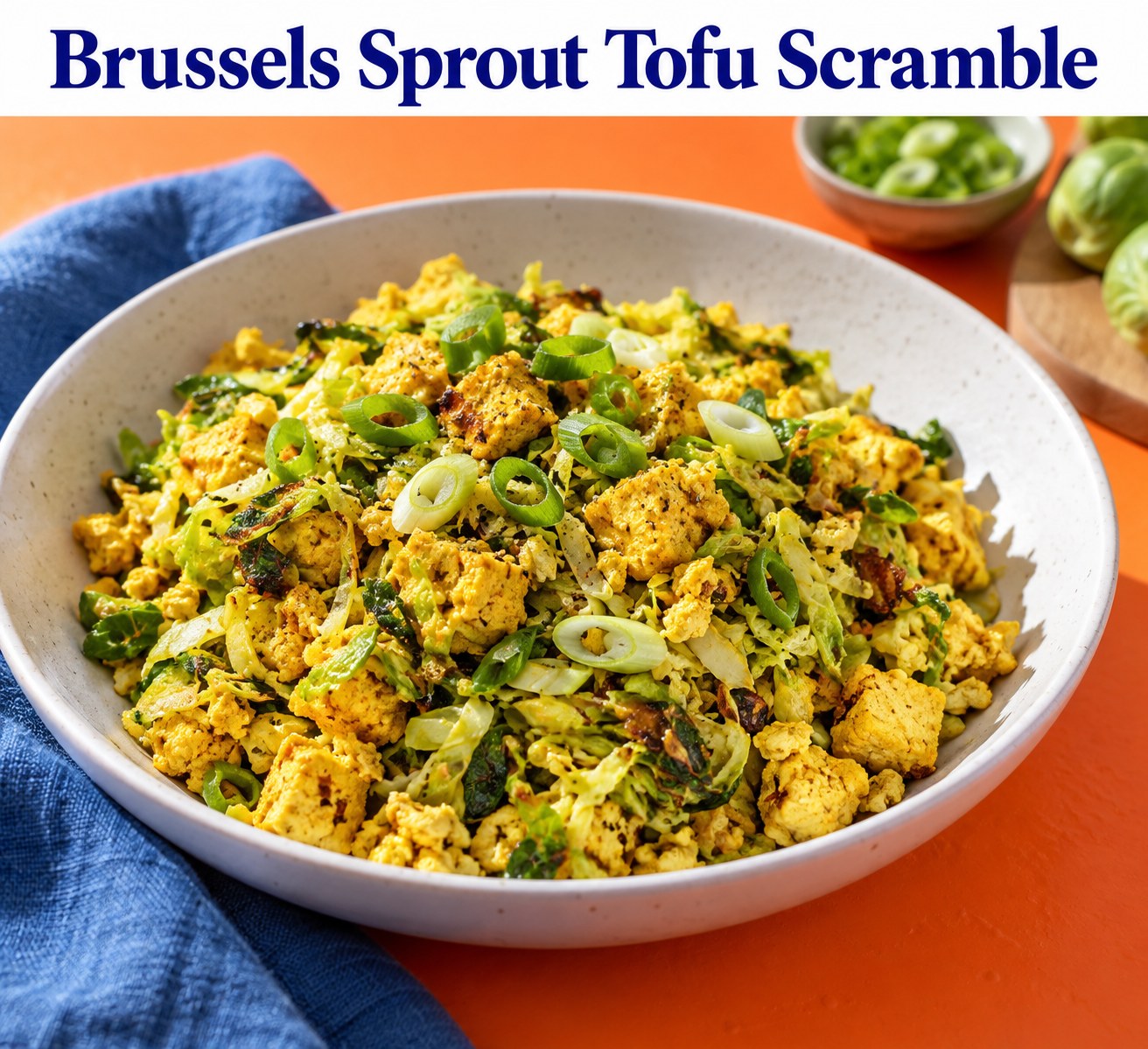 Tofu scramble with shredded Brussels sprouts beneath the words Brussels Sprout Tofu Scramble.