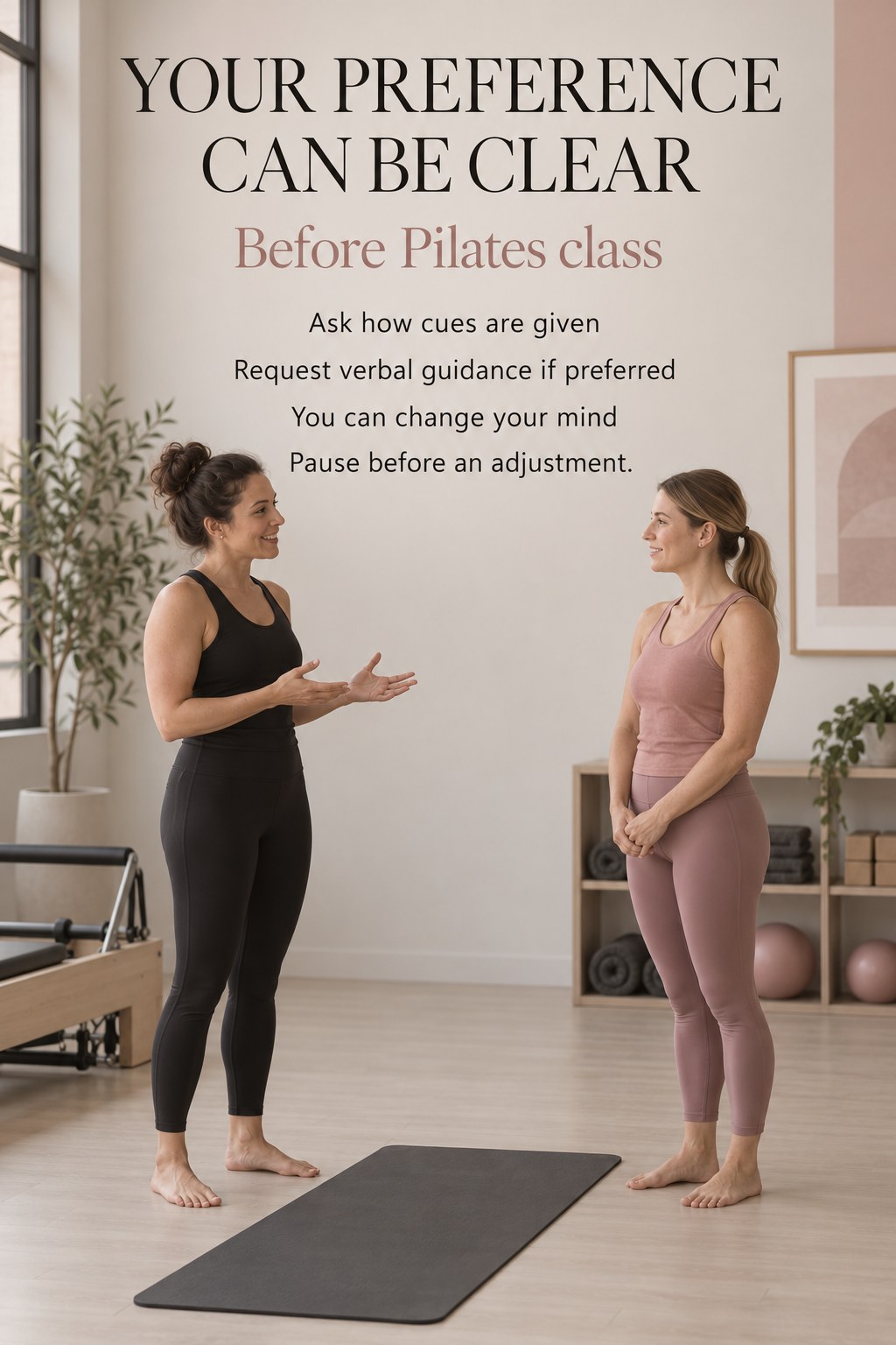 Two adults talking beside a Pilates mat before a class without physical contact.